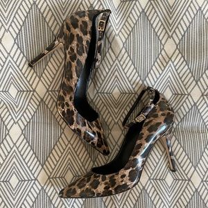 Leopard point toe pumps